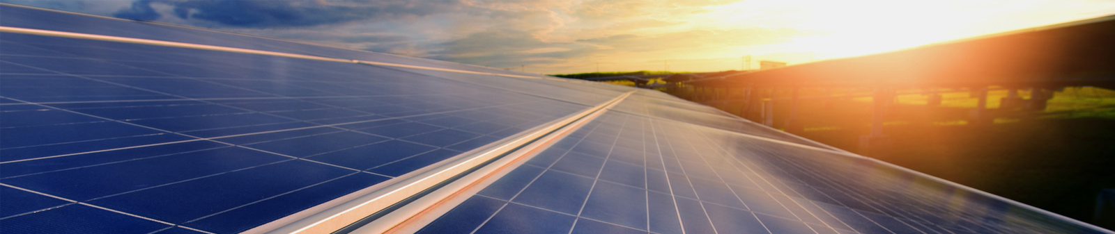 solar panel angling into sunset